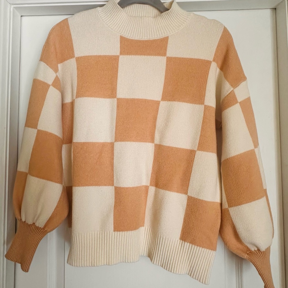 Elegant Cream and Tan Checkered Turtleneck Sweater